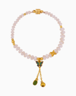 دستبند زنانه صدفی با آویز پروانه آبی و زنگوله طلایی