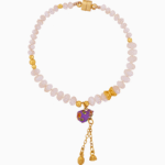 دستبند زنانه صدفی آویز قلب بنفش و پروانه طلایی