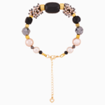 دستبند زنانه شوکا مدل حدید و مروارید طلایی دست‌ساز