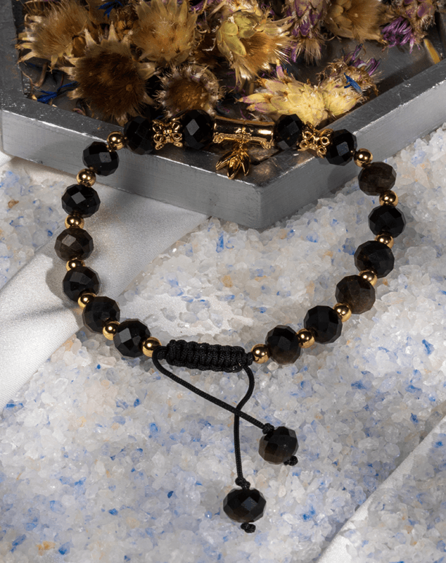 دستبند زنانه اوبسیدین شاین طلایی | آویز صلیب طلایی | شوکا