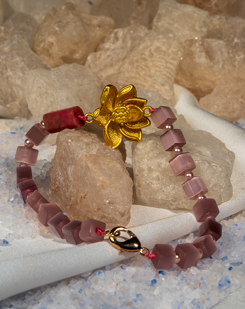 Embrace love and compassion with our Women’s Rhodonite Bracelet. Featuring a delicate silver lotus charm and soft pink beads, this piece is a symbol of emotional healing and elegance. Embrace love and compassion with our Women’s Rhodonite Bracelet. Featuring a delicate silver lotus charm and soft pink beads, this piece is a symbol of emotional healing and elegance.