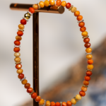 دستبند زنانه سنگ مرجان نارنجی