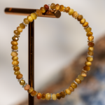 دستبند زنانه کهربا کرمی قهوه‌ای