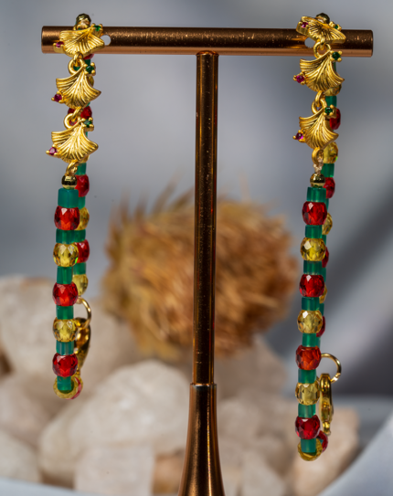 دستبند زنانه مهرهای سبز، قرمز و طلایی طرح پیچیده