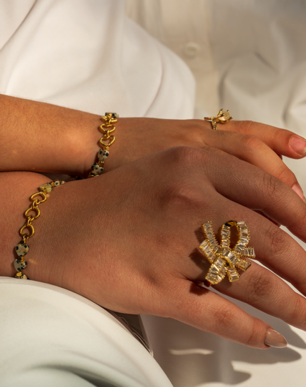 دستبند نوجوانانه شوکا مدل سنگ دالماتین و قلب طلایی