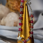 دستبند نوجوان تورمالین صورتی با مهرههای نقرهای و آویز ستاره